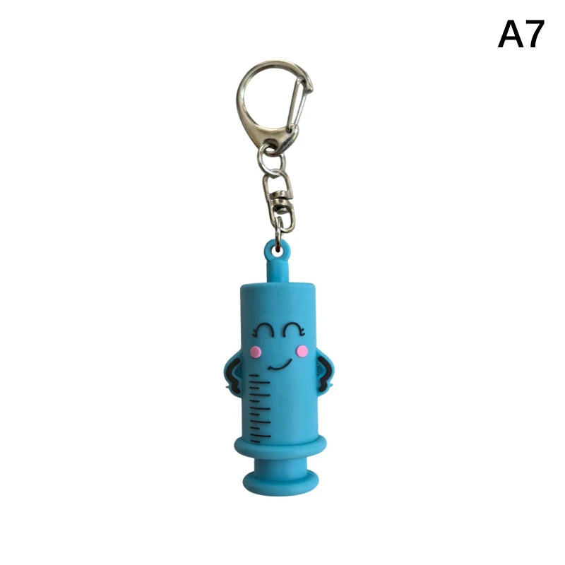 Ouvre-ampoule en forme de seringue avec porte-clés