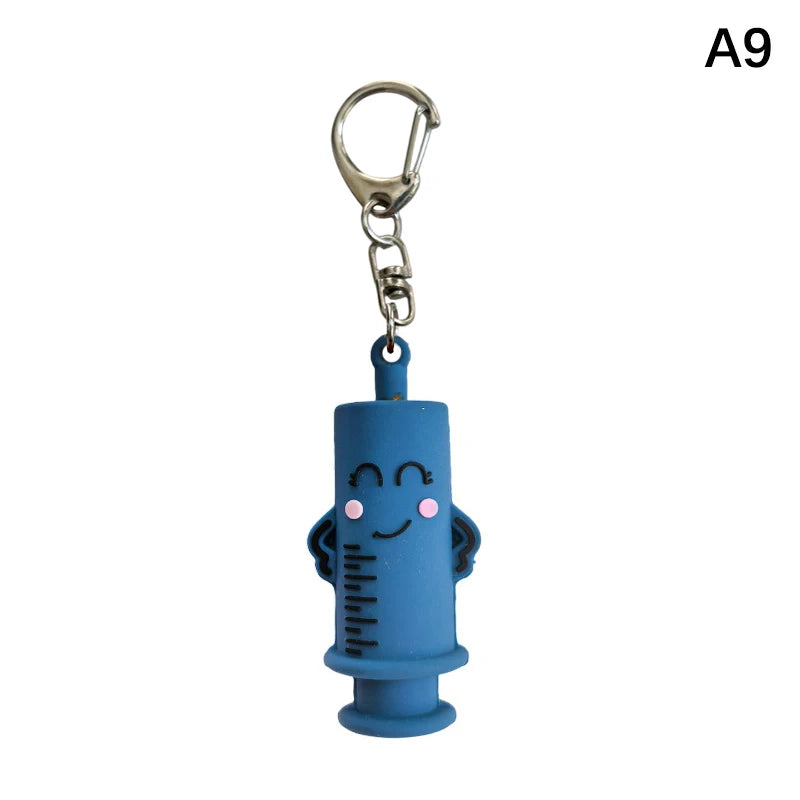 Ouvre-ampoule en forme de seringue avec porte-clés