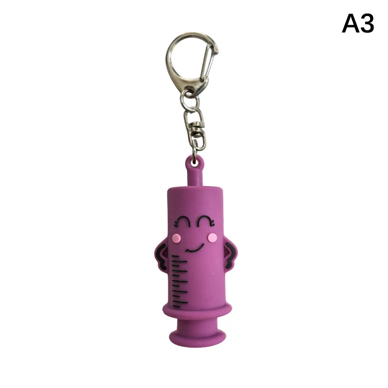 Ouvre-ampoule en forme de seringue avec porte-clés
