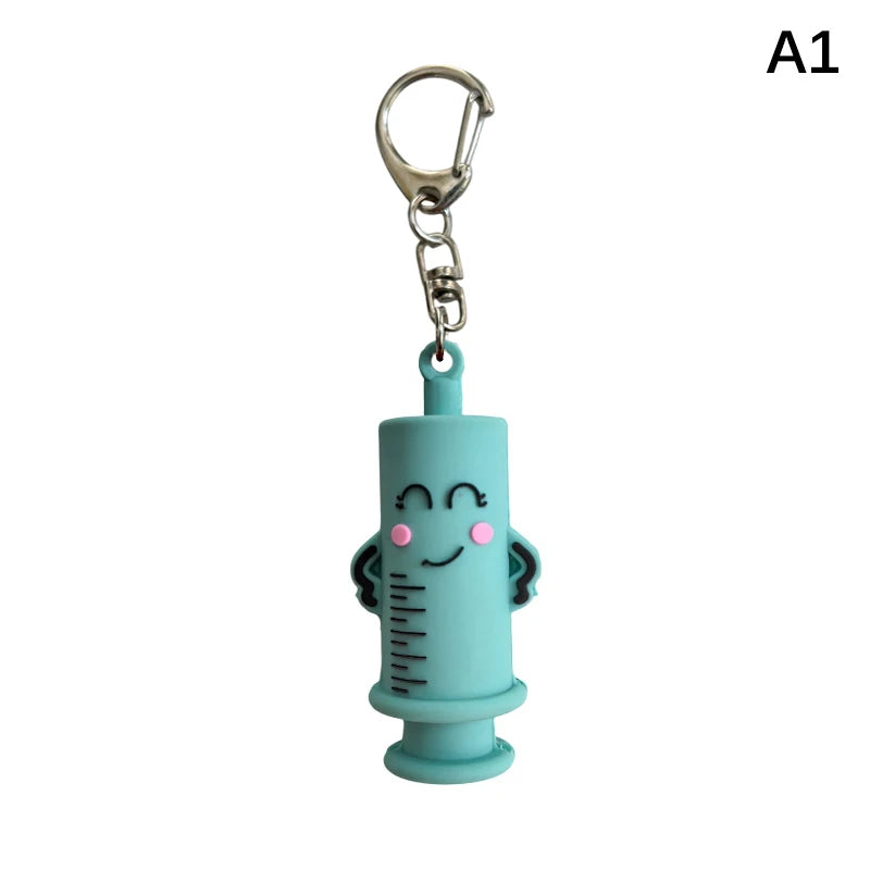 Ouvre-ampoule en forme de seringue avec porte-clés
