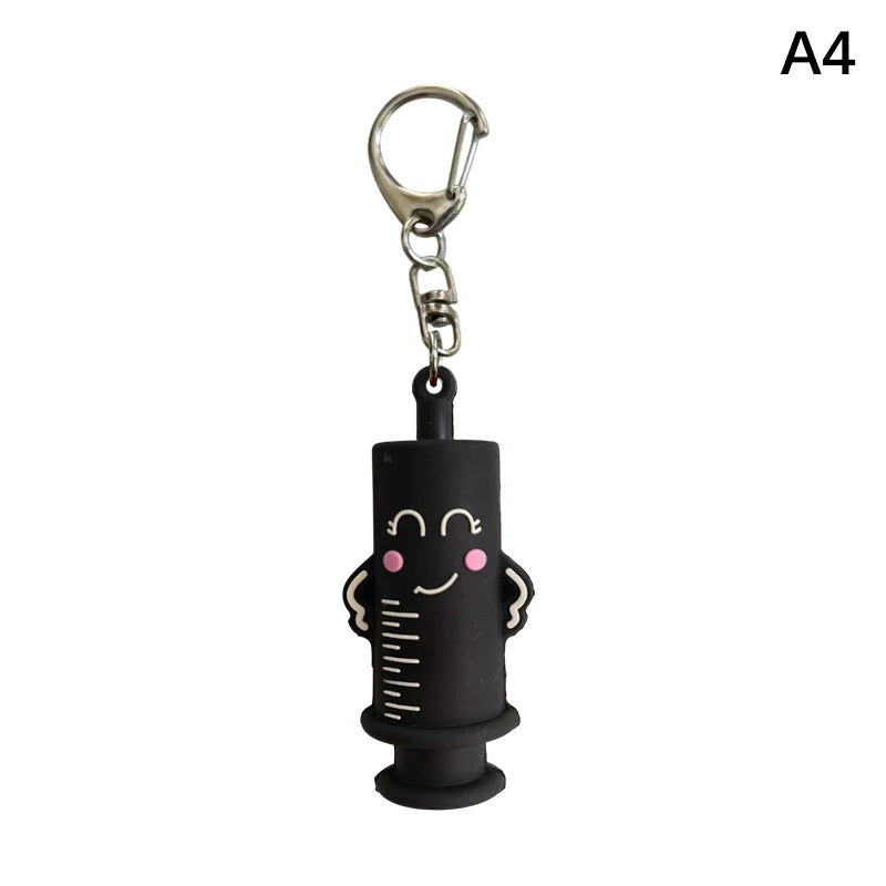 Ouvre-ampoule en forme de seringue avec porte-clés