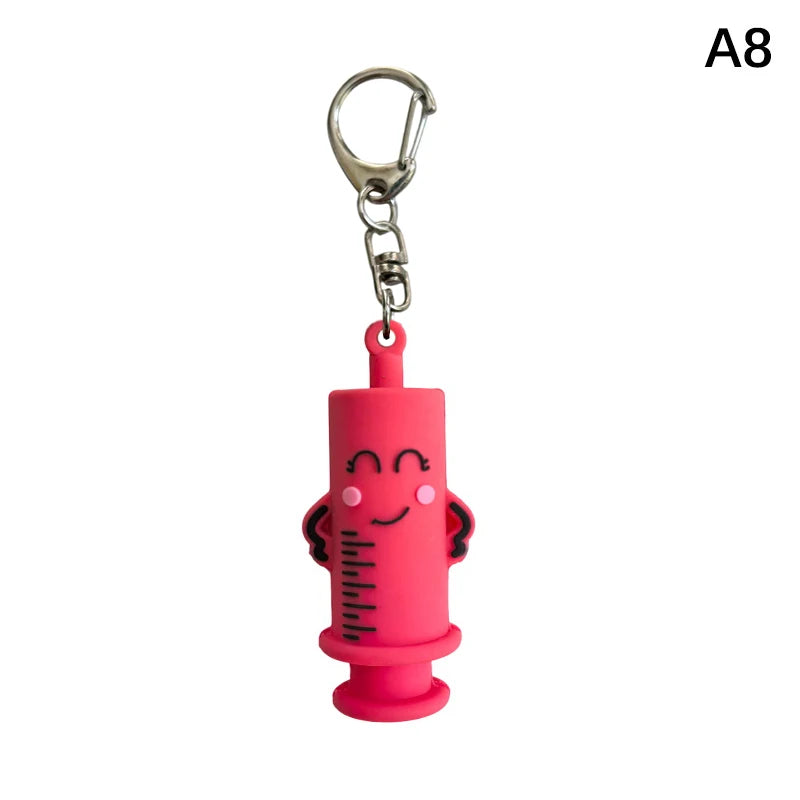 Ouvre-ampoule en forme de seringue avec porte-clés